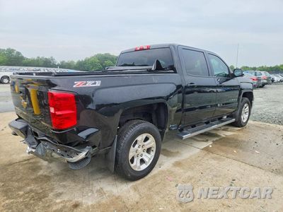 Trzecie zdjęcie samochodu z tyłu: 2015 CHEVROLET SILVERADO K1500 LT VIN:3GCUKREC7FG528948 - miniatura