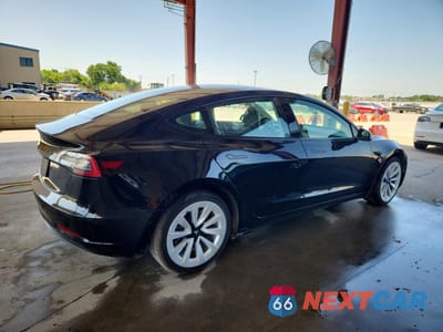 Trzecie zdjęcie samochodu z tyłu: 2022 TESLA MODEL 3 VIN:5YJ3E1EA4NF372049 - miniatura