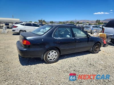 Trzecie zdjęcie samochodu z tyłu: 2000 TOYOTA COROLLA VE VIN:1NXBR12E4YZ393319 - miniatura