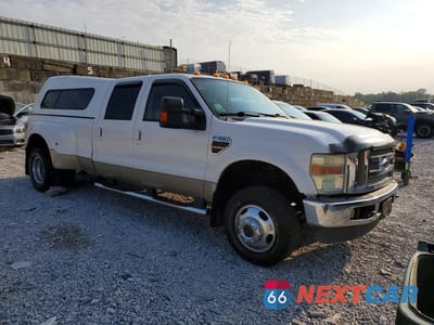 Czwarte zdjęcie samochodu z boku: 2010 FORD F350 SUPER DUTY VIN:1FTWW3DR1AEB28335 - miniatura