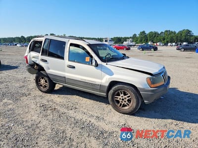 Czwarte zdjęcie samochodu z boku: 2002 JEEP GRAND CHEROKEE LAREDO VIN:1J4GX48S92C172305 - miniatura