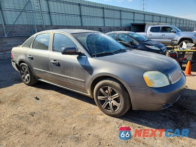 Czwarte zdjęcie samochodu z boku: 2005 MERCURY MONTEGO PREMIER VIN:1MEHM43155G600495 - miniatura