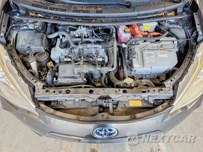 Zdjęcie 11 z 12 samochodu: 2012 TOYOTA PRIUS C FOUR VIN:JTDKDTB37C1030570 - miniatura