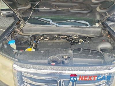 Zdjęcie 11 z 12 samochodu: 2013 HONDA PILOT TOURING VIN:5FNYF3H97DB021716 - miniatura