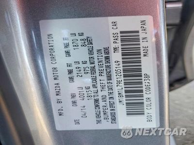 Zdjęcie 25 z 26 samochodu: 2014 MAZDA 3 TOURING VIN:JM1BM1L79E1205149 - miniatura