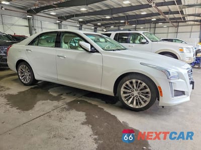 Czwarte zdjęcie samochodu z boku: 2016 CADILLAC CTS LUXURY COLLECTION VIN:1G6AX5SX7G0107602 - miniatura