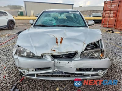 Piąte zdjęcie samochodu w środku: 2005 HYUNDAI ELANTRA GLS VIN:KMHDN46D15U081526 - miniatura