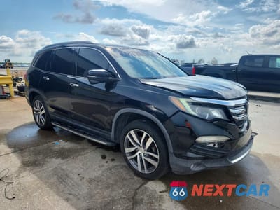 Czwarte zdjęcie samochodu z boku: 2016 HONDA PILOT TOURING VIN:5FNYF5H92GB048306 - miniatura