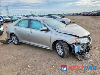 Czwarte zdjęcie samochodu z boku: 2014 TOYOTA CAMRY XLE VIN:4T4BF1FK7ER337997 - miniatura