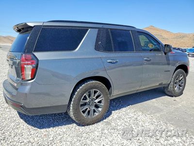 Trzecie zdjęcie samochodu z tyłu: 2021 CHEVROLET TAHOE K1500 Z71 VIN:1GNSKPKD2MR260601 - miniatura