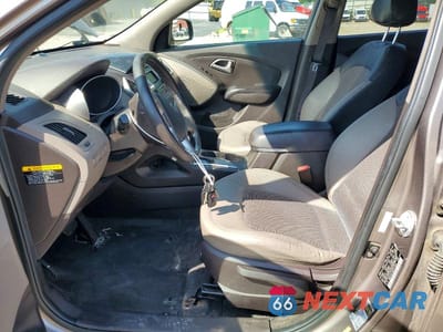 Zdjęcie 7 z 13 samochodu: 2013 HYUNDAI TUCSON GLS VIN:KM8JUCAC0DU677434 - miniatura