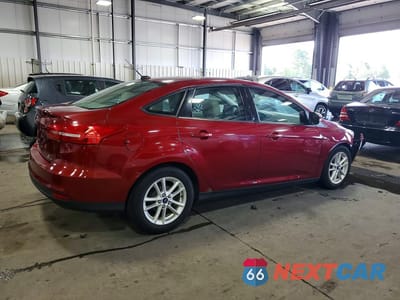 Trzecie zdjęcie samochodu z tyłu: 2015 FORD FOCUS SE VIN:1FADP3F20FL300190 - miniatura
