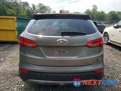 Zdjęcie 6 z 13 samochodu: 2013 HYUNDAI SANTA FE SPORT 2.4L VIN:5XYZU3LB0DG004172 - miniatura