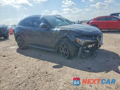 Czwarte zdjęcie samochodu z boku: 2023 ALFA ROMEO STELVIO TI VIN:ZASPAKBN2P7D50481 - miniatura