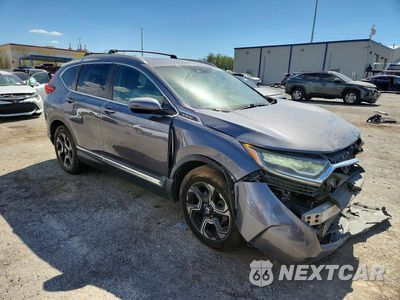 Czwarte zdjęcie samochodu z boku: 2019 HONDA CR-V TOURING VIN:7FARW1H95KE001104 - miniatura