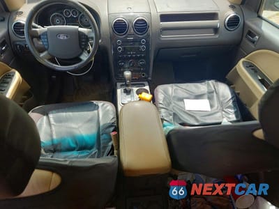 Zdjęcie 8 z 12 samochodu: 2008 FORD TAURUS X SEL VIN:1FMDK05W28GA00735 - miniatura