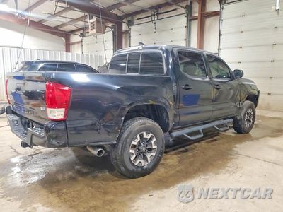 Trzecie zdjęcie samochodu z tyłu: 2018 TOYOTA TACOMA SR V6 VIN:3TMCZ5AN9JM130948 - miniatura