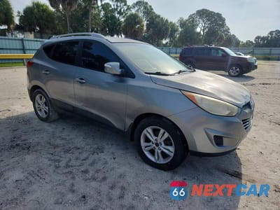 Czwarte zdjęcie samochodu z boku: 2012 HYUNDAI TUCSON GLS VIN:KM8JU3AC2CU485494 - miniatura