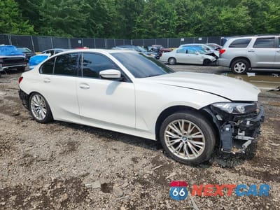 Czwarte zdjęcie samochodu z boku: 2023 BMW 330XI VIN:3MW89FF09P8D04752 - miniatura