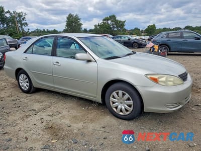 Czwarte zdjęcie samochodu z boku: 2003 TOYOTA CAMRY LE VIN:JTDBE32K230169676 - miniatura
