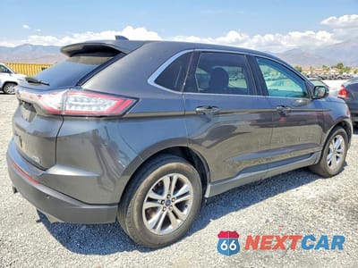 Trzecie zdjęcie samochodu z tyłu: 2015 FORD EDGE SEL VIN:2FMPK4J85FBC26977 - miniatura