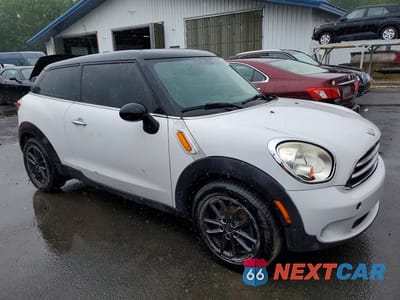 Czwarte zdjęcie samochodu z boku: 2015 MINI COOPER PACEMAN VIN:WMWSS1C52FWN94917 - miniatura