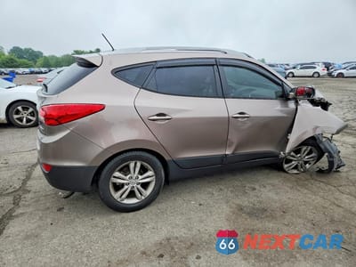 Trzecie zdjęcie samochodu z tyłu: 2011 HYUNDAI TUCSON VIN:KM8JUCAC9BU205827 - miniatura