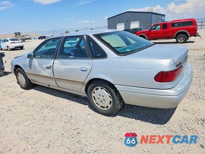 Drugie zdjęcie samochodu z przodu: 1995 FORD TAURUS GL/SE VIN:1FALP5244SG323943 - miniatura