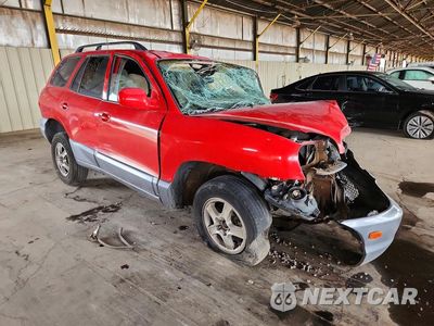 Czwarte zdjęcie samochodu z boku: 2004 HYUNDAI SANTA FE GLS VIN:KM8SC13D94U855164 - miniatura
