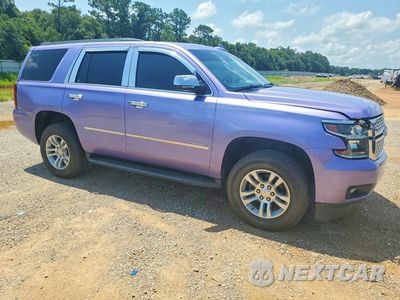 Czwarte zdjęcie samochodu z boku: 2019 CHEVROLET TAHOE C1500 LT VIN:1GNSCBKC9KR288917 - miniatura