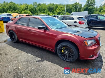 Czwarte zdjęcie samochodu z boku: 2013 CHRYSLER 300 SRT-8 VIN:2C3CCAFJ2DH513220 - miniatura