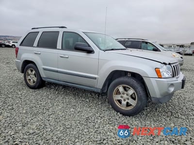 Czwarte zdjęcie samochodu z boku: 2007 JEEP GRAND CHEROKEE LAREDO VIN:1J8GR48KX7C513548 - miniatura