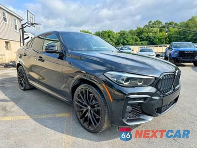 Czwarte zdjęcie samochodu z boku: 2022 BMW X6 XDRIVE40I VIN:5UXCY6C05N9L63884 - miniatura