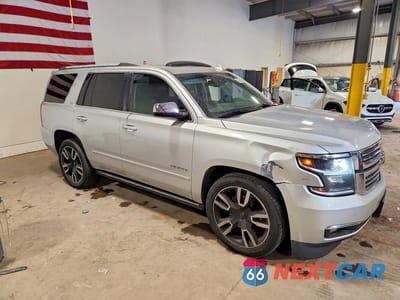Czwarte zdjęcie samochodu z boku: 2015 CHEVROLET TAHOE K1500 LTZ VIN:1GNSKCKC9FR514355 - miniatura