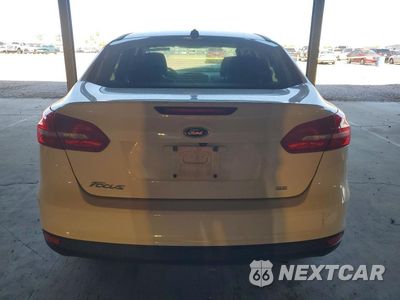 Zdjęcie 6 z 13 samochodu: 2018 FORD FOCUS SE VIN:1FADP3F29JL230679 - miniatura
