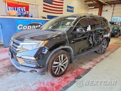 2018 HONDA PILOT TOURING 5FNYF5H90JB011956 - główne zdjęcie licytacji z USA - miniatura