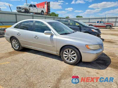 Czwarte zdjęcie samochodu z boku: 2006 HYUNDAI AZERA VIN:KMHFC46F96A057025 - miniatura