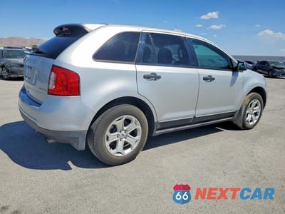 Trzecie zdjęcie samochodu z tyłu: 2011 FORD EDGE SE VIN:2FMDK3G96DBA13529 - miniatura