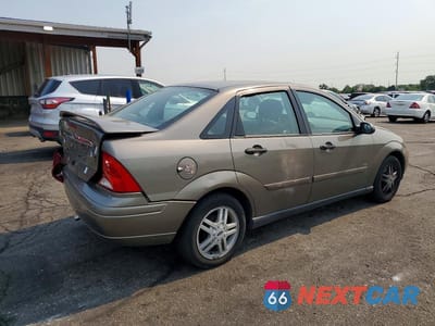 Trzecie zdjęcie samochodu z tyłu: 2000 FORD FOCUS SE VIN:1FAFP343XYW308478 - miniatura