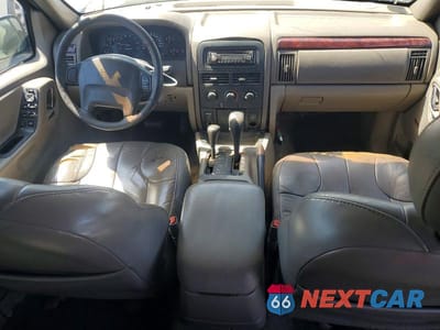 Zdjęcie 8 z 13 samochodu: 2000 JEEP GRAND CHEROKEE LAREDO VIN:1J4GW48S1YC195685 - miniatura
