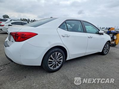 Trzecie zdjęcie samochodu z tyłu: 2019 TOYOTA COROLLA XLE VIN:5YFBURHE8KP911882 - miniatura