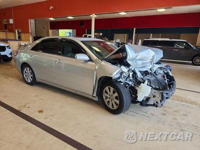 Czwarte zdjęcie samochodu z boku: 2007 TOYOTA CAMRY HYBRID VIN:JTNBB46K773026408 - miniatura