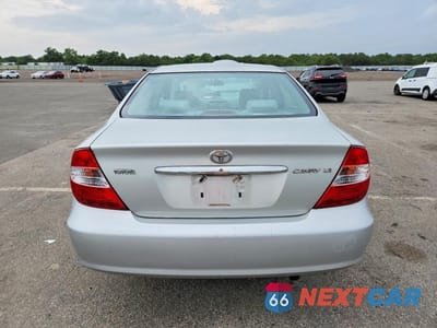 Zdjęcie 6 z 12 samochodu: 2002 TOYOTA CAMRY LE VIN:4T1BE32K22U092570 - miniatura