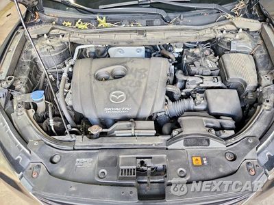 Zdjęcie 12 z 13 samochodu: 2016 MAZDA CX-5 GT VIN:JM3KE4DY8G0809846 - miniatura