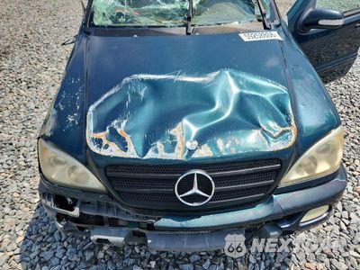 Zdjęcie 12 z 13 samochodu: 2003 MERCEDES-BENZ ML 320 VIN:4JGAB54E83A378353 - miniatura