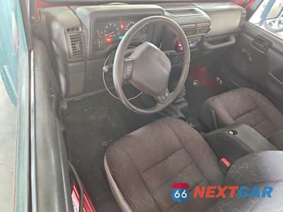 Zdjęcie 8 z 12 samochodu: 2002 JEEP WRANGLER / TJ SPORT VIN:1J4FA49S62P770761 - miniatura