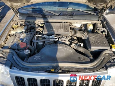 Zdjęcie 12 z 13 samochodu: 1999 JEEP GRAND CHEROKEE LIMITED VIN:1J4GW68N0XC527880 - miniatura