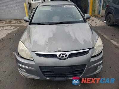 Piąte zdjęcie samochodu w środku: 2010 HYUNDAI ELANTRA TOURING GLS VIN:KMHDC8AE3AU074777 - miniatura