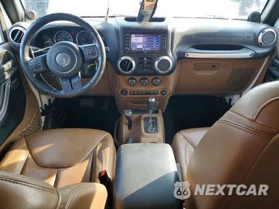 Zdjęcie 8 z 13 samochodu: 2014 JEEP WRANGLER UNLIMITED SAHARA VIN:1C4BJWEG8EL107172 - miniatura