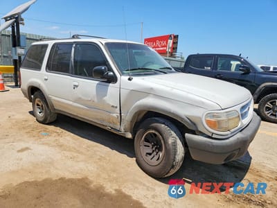 Czwarte zdjęcie samochodu z boku: 1999 FORD EXPLORER VIN:1FMZU34X0XZB40023 - miniatura